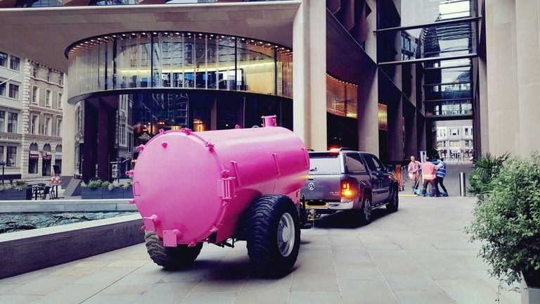 Custom job completion turning a metal rusted tank to custom pink colour for a business client for an art exhibition